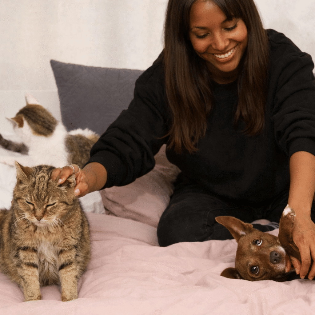 black woman petting cat