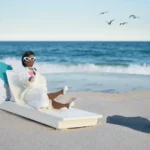 Black barbie solo vacation on the beach